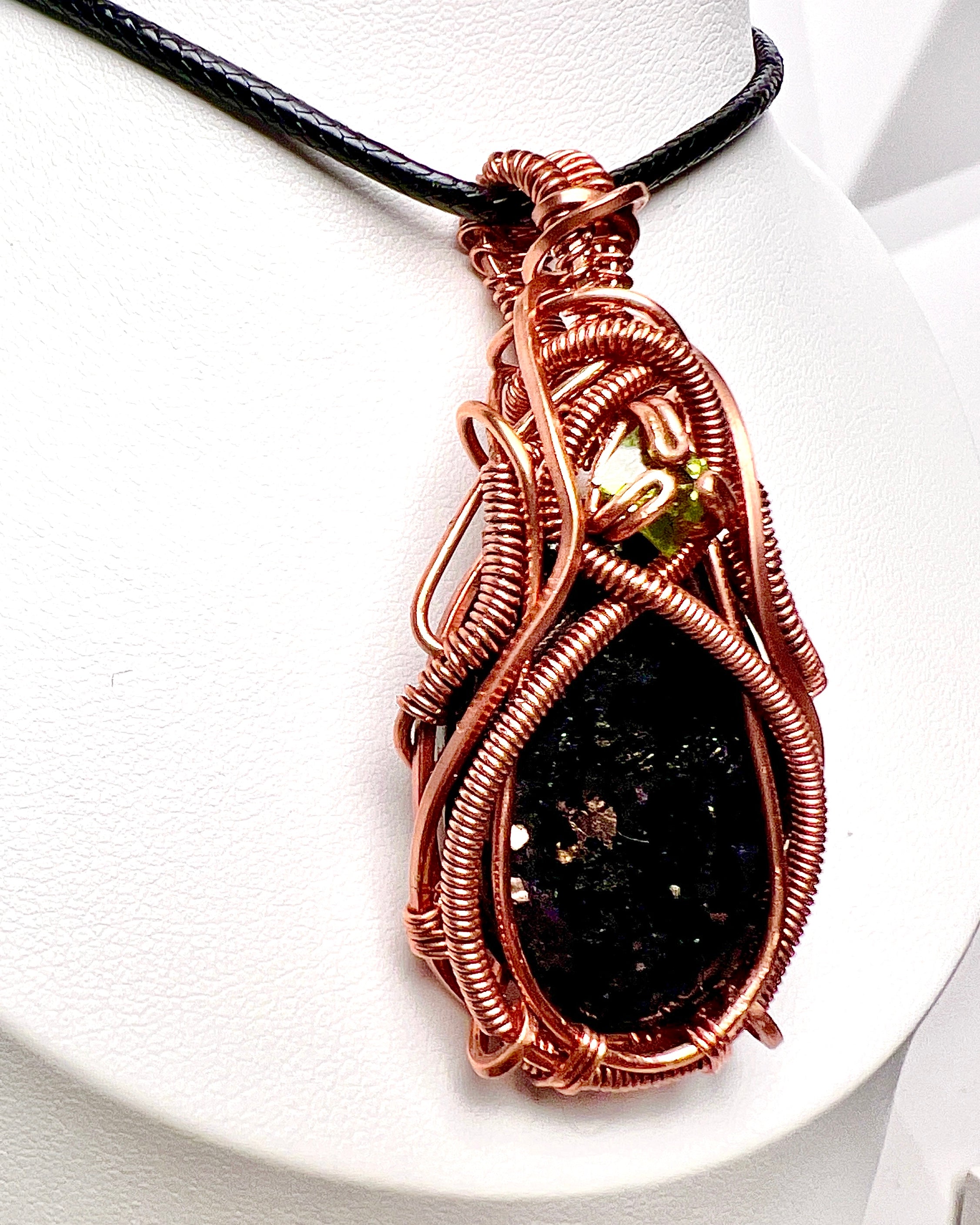 Nuummite & Peridot Pendant Necklace Wrapped in Pure Copper | Handmade Copper Wire Wrapped Nuummite Pendant with Peridot Accent